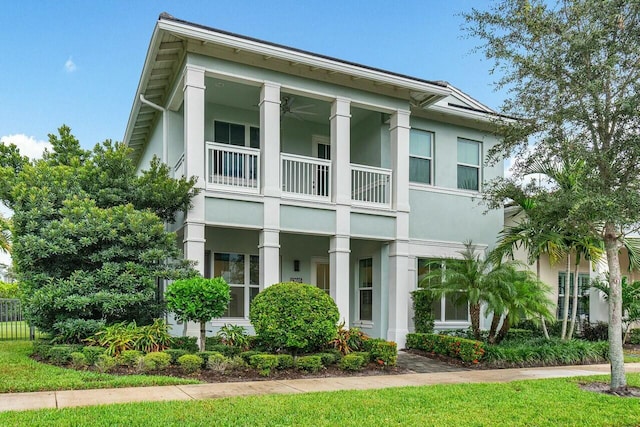 view of front of home with a balcony