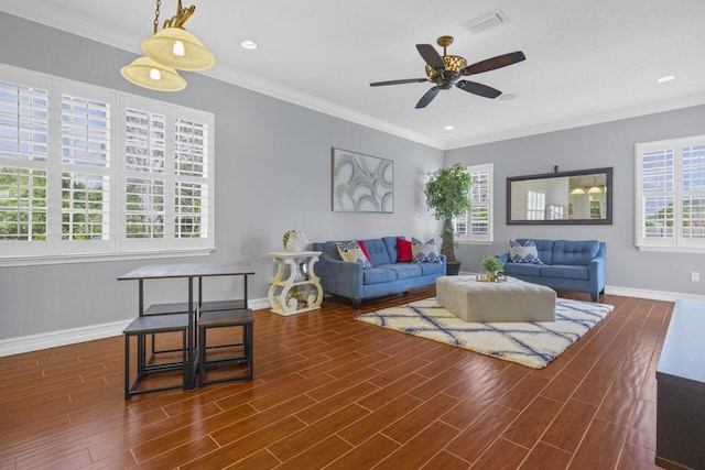 living room with ornamental molding, ceiling fan, and dark hardwood / wood-style flooring