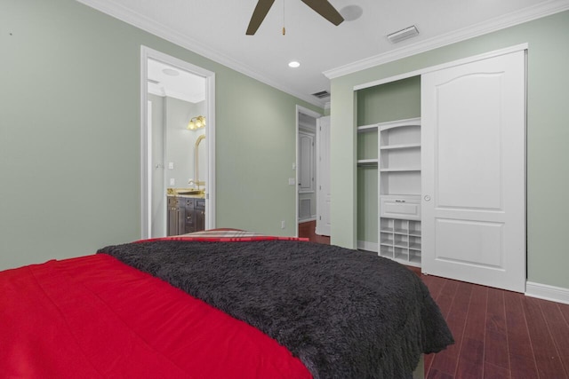 bedroom with ensuite bathroom, ornamental molding, dark hardwood / wood-style floors, a closet, and ceiling fan