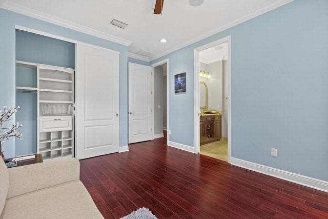 living room featuring ceiling fan, ornamental molding, and dark hardwood / wood-style flooring