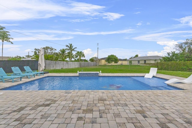 view of swimming pool featuring a patio area