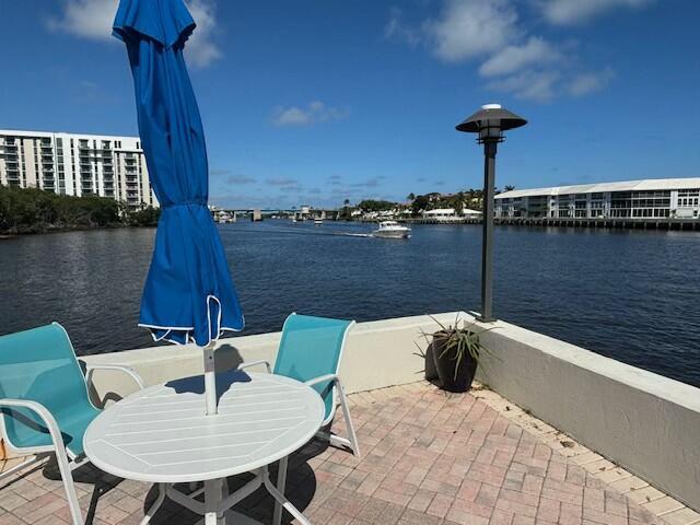 view of patio / terrace featuring a water view