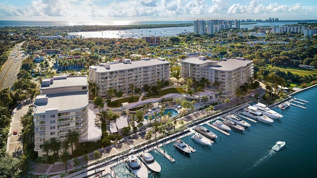 birds eye view of property featuring a water view