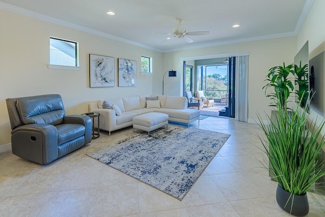 living room featuring light tile patterned flooring, ceiling fan, and crown molding