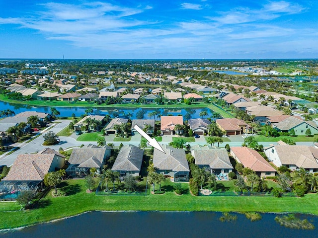 drone / aerial view featuring a water view