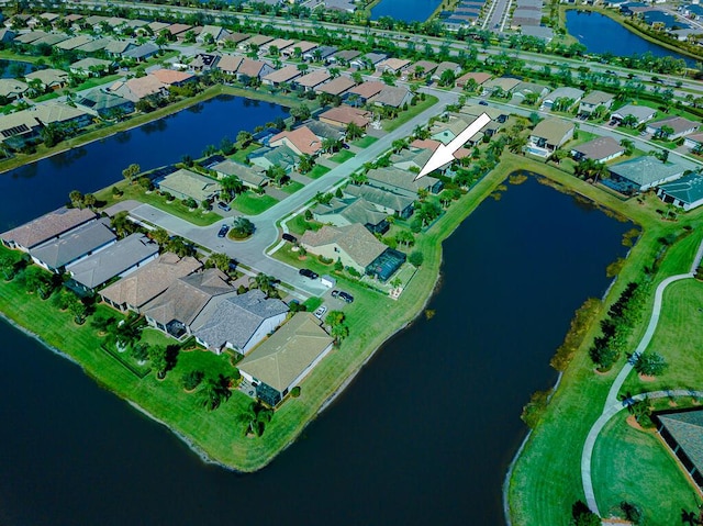 drone / aerial view featuring a water view