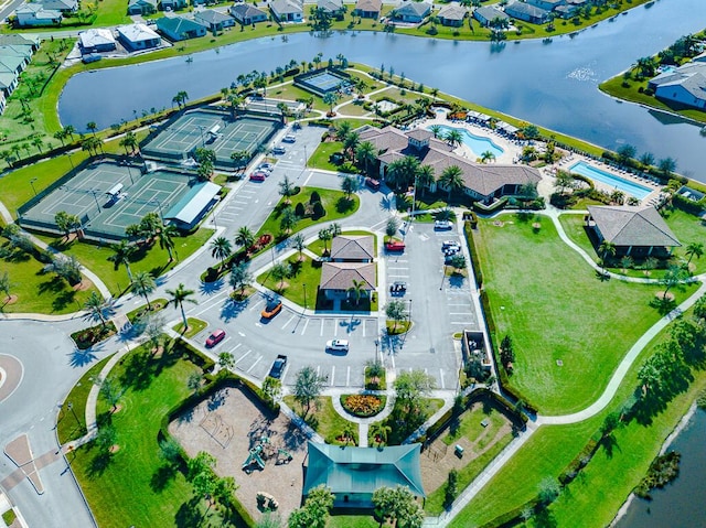 bird's eye view with a water view