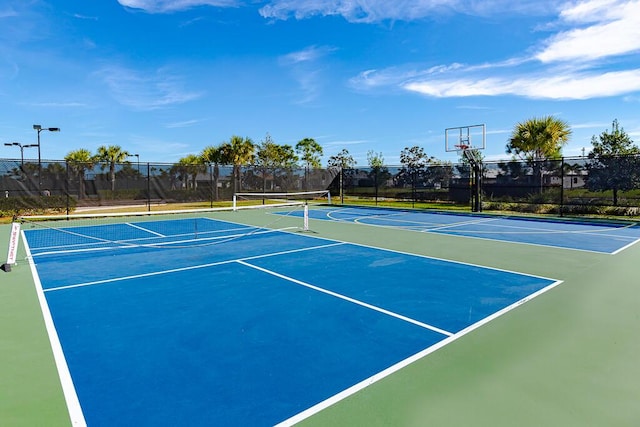 view of tennis court with basketball court