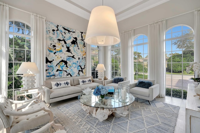 living room with ornamental molding