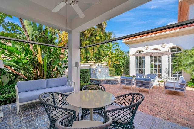 view of patio / terrace with an outdoor hangout area and ceiling fan