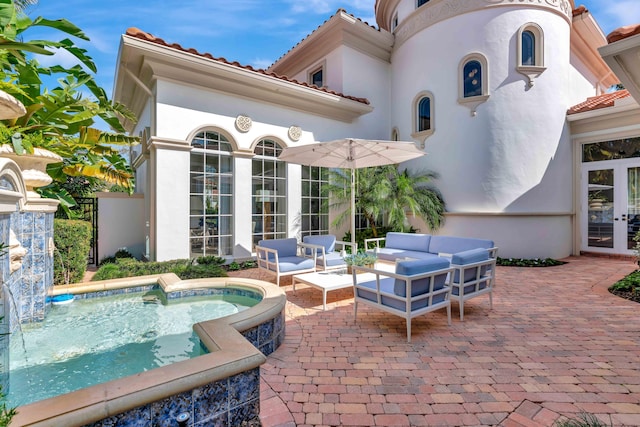 view of patio featuring an outdoor hangout area and french doors