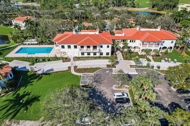 birds eye view of property with a water view