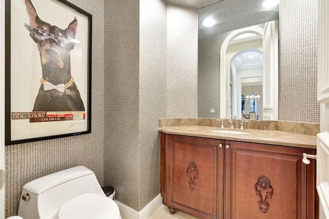 bathroom with vanity and toilet