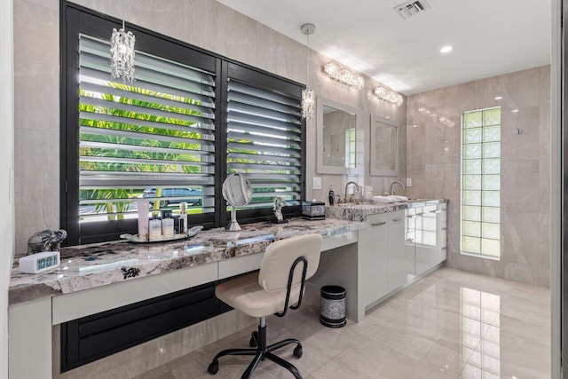 11955 N Lake Dr, Boynton Beach, FL 33436 - office area featuring sink, tile walls, and a wealth of natural light