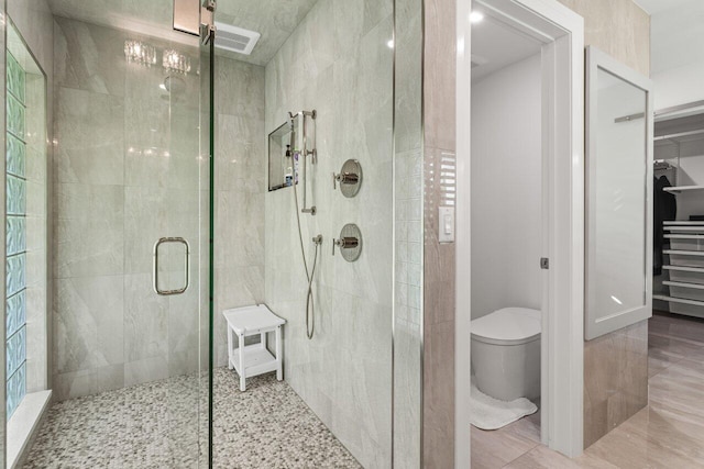 11955 N Lake Dr, Boynton Beach, FL 33436 - bathroom featuring an enclosed shower and toilet