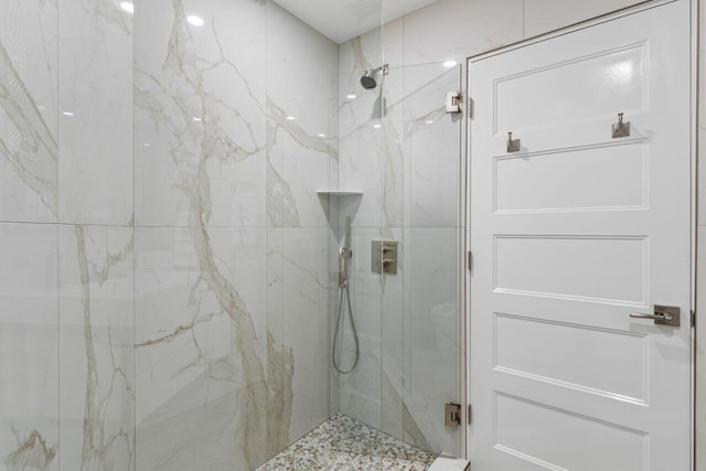 11955 N Lake Dr, Boynton Beach, FL 33436 - bathroom with a shower with shower door
