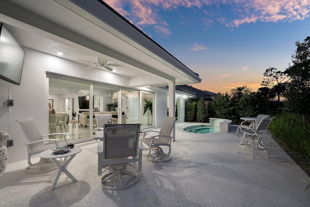 11955 N Lake Dr, Boynton Beach, FL 33436 - view of patio with ceiling fan and a swimming pool with hot tub