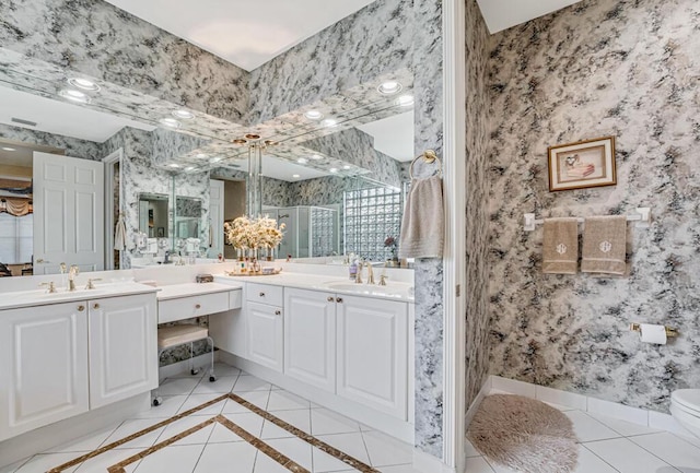 bathroom with vanity and an enclosed shower