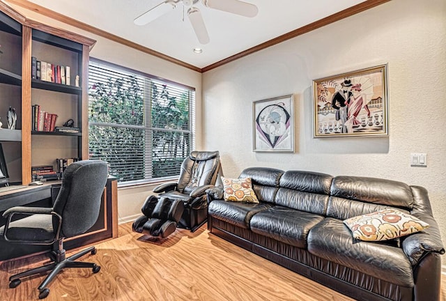 home office with crown molding, ceiling fan, and hardwood / wood-style flooring