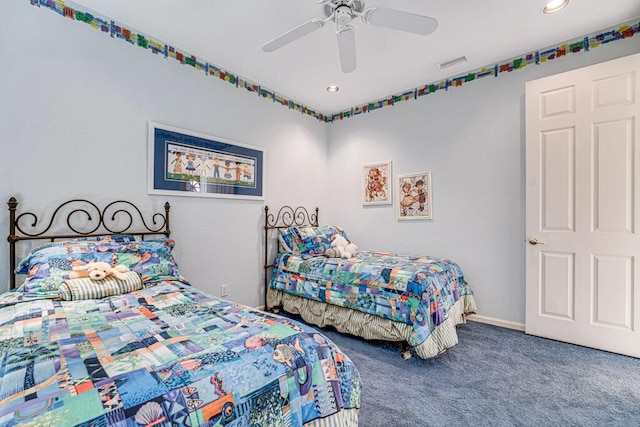 bedroom featuring ceiling fan and carpet