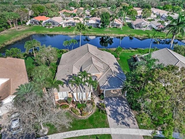 drone / aerial view with a water view