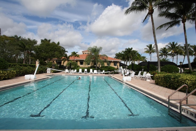 view of swimming pool with a patio area