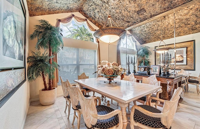 dining space featuring brick ceiling and high vaulted ceiling