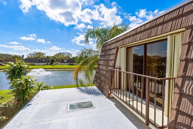 exterior space with a water view