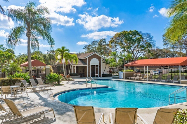 view of swimming pool with a patio area