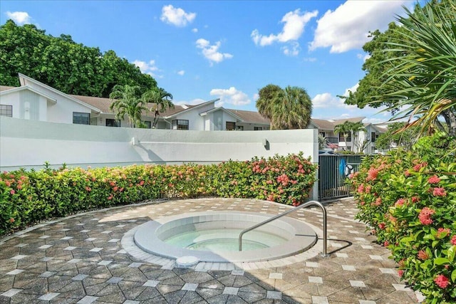 view of patio featuring a community hot tub