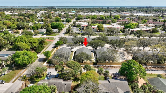 birds eye view of property with a residential view