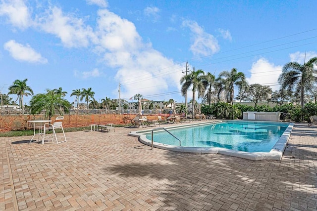 view of pool featuring a patio