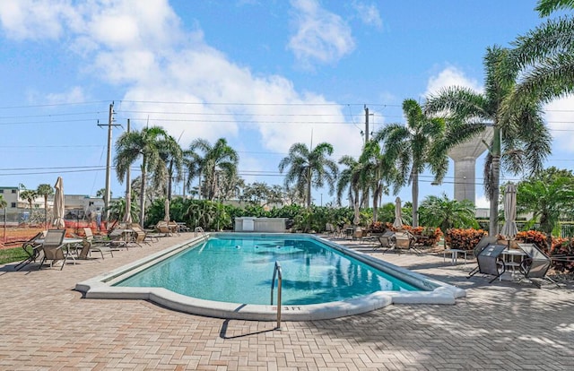 view of pool featuring a patio