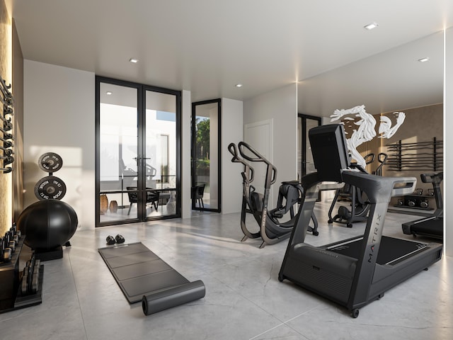 exercise room featuring floor to ceiling windows and french doors