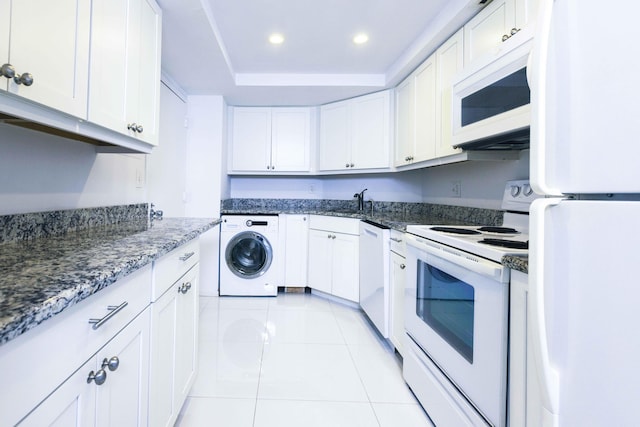 kitchen with white cabinetry, washer / clothes dryer, white appliances, and light tile patterned flooring