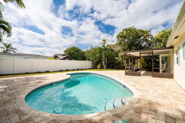 view of pool with a patio area, a fenced backyard, and a fenced in pool