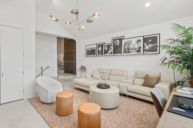 living room with an inviting chandelier and high vaulted ceiling