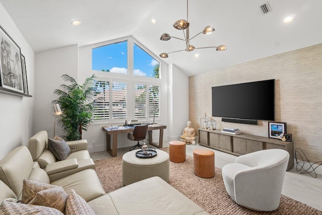 living room featuring vaulted ceiling and an inviting chandelier