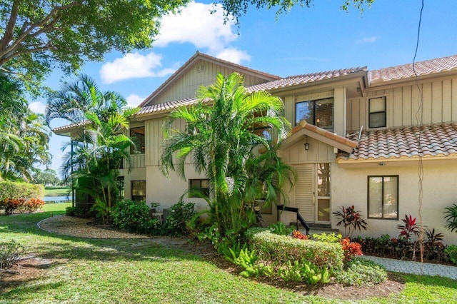 view of home's exterior featuring a yard