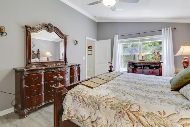 bedroom featuring crown molding, ceiling fan, vaulted ceiling, and light wood-type flooring