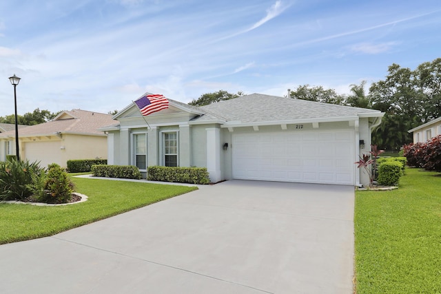 ranch-style home with a garage and a front yard