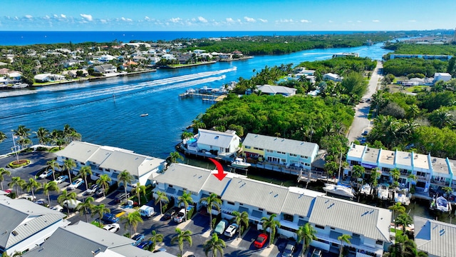 drone / aerial view featuring a water view