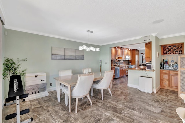 dining space featuring crown molding, a textured ceiling, and a chandelier