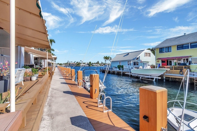 view of dock with a water view