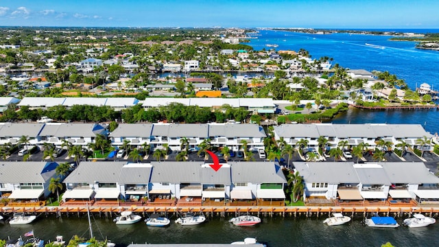 aerial view featuring a water view and a residential view