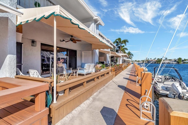 dock area with a water view