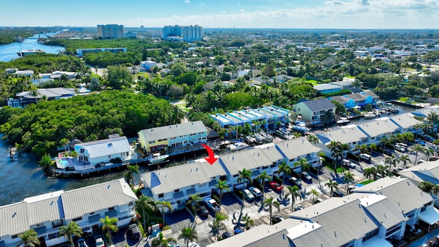 birds eye view of property featuring a water view