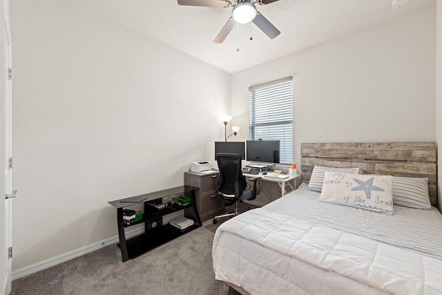 bedroom featuring light colored carpet and ceiling fan