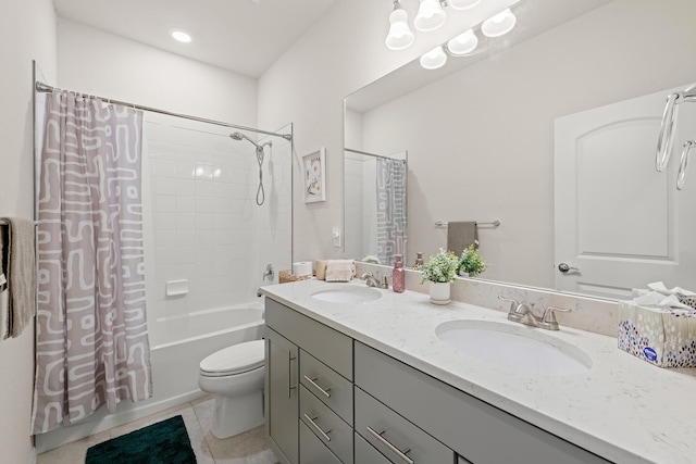 full bathroom with shower / bath combination with curtain, tile patterned floors, vanity, and toilet