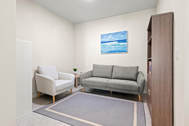 sitting room featuring light tile patterned flooring